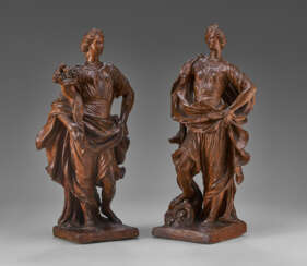 A PAIR OF TERRACOTTA ALLEGORICAL FIGURES OF ABUNDANCE AND FORTUNE