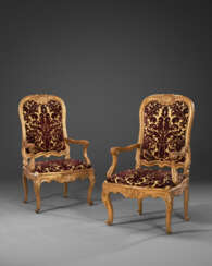 A PAIR OF ITALIAN GILTWOOD ARMCHAIRS