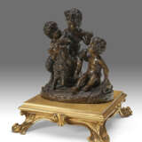 A PAIR OF BRONZE GROUPS OF PUTTI - фото 7