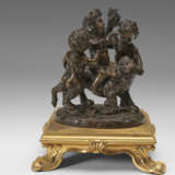 A PAIR OF BRONZE GROUPS OF PUTTI - фото 9