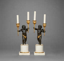 A PAIR OF DIRECTOIRE ORMOLU, PATINATED-BRONZE AND WHITE MARBLE TWO-LIGHT CANDELABRA
