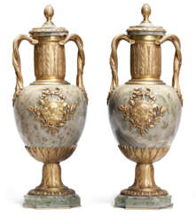 A PAIR OF FRENCH ORMOLU-MOUNTED MARBLE TWO-HANDLED VASES AND COVERS