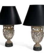 Placage d'argent. A PAIR OF SILVERED-BRASS AND COPPER VASES, NOW MOUNTED AS LAMPS