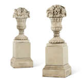 A PAIR OF COMPOSITION STONE FRUITING CAMPANA URNS ON PEDESTALS - photo 1