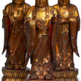 THREE GILT-LACQUER WOOD FIGURES OF BUDDHA - фото 1