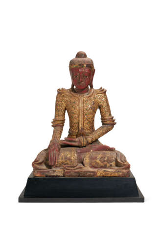 A SOUTH-EAST ASIAN RED-PAINTED AND PARCEL-GILT SEATED FIGURE OF BUDDHA - photo 1