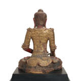 A SOUTH-EAST ASIAN RED-PAINTED AND PARCEL-GILT SEATED FIGURE OF BUDDHA - фото 4