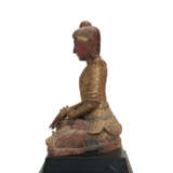 A SOUTH-EAST ASIAN RED-PAINTED AND PARCEL-GILT SEATED FIGURE OF BUDDHA - photo 5
