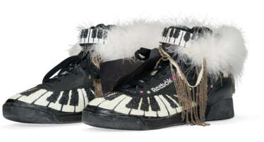 A PAIR OF BLACK AND WHITE 'PIANO' SNEAKERS