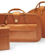 Кожа. A SET OF THREE FITTED TAN LEATHER LUGGAGE FOR A FERRARI 456 GT