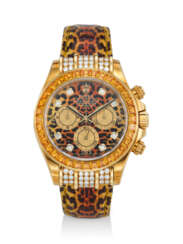 ROLEX. AN EXUBERANT AND RARE 18K GOLD, DIAMOND, AND ORANGE SAPPHIRE AUTOMATIC CHRONOGRAPH WRISTWATCH WITH &#39;LEOPARD&#39; DIAL