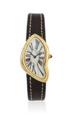 CARTIER. A HIGHLY DESIRABLE AND RARE 18K GOLD LIMITED EDITION ASYMMETRICAL WRISTWATCH WITH ‘CRASH’ DEPLOYANT CLASP