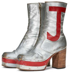A PAIR OF SILVER LEATHER TALL PLATFORM BOOTS