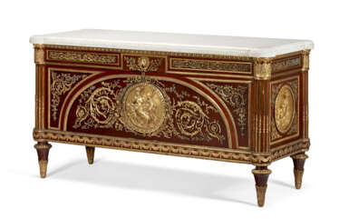 A FRENCH GILT-METAL-MOUNTED MAHOGANY COMMODE A VANTAUX