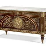 A FRENCH GILT-METAL-MOUNTED MAHOGANY COMMODE A VANTAUX - photo 1