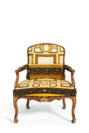 A PAIR OF FRENCH PARCEL-GILT AND STAINED BEECH FAUTEUILS - photo 2