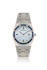 AUDEMARS PIGUET. AN 18K WHITE GOLD AND SAPPHIRE SET QUARTZ WRISTWATCH WITH BLUE MOTHER OF PEARL DIAL AND DATE