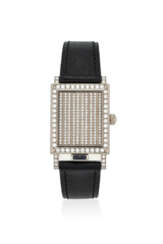 VACHERON CONSTANTIN. AN 18K WHITE GOLD AND DIAMOND-SET RECTANGULAR WRISTWATCH WITH CONCEALED DIAL