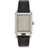 VACHERON CONSTANTIN. AN 18K WHITE GOLD AND DIAMOND-SET RECTANGULAR WRISTWATCH WITH CONCEALED DIAL - фото 1