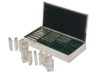 AN ITALIAN PARCEL-GILT SILVER DOMINO SET AND CASE