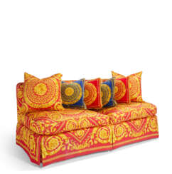 AN ATELIER VERSACE CRIMSON AND GOLD UPHOLSTERED BANQUETTE