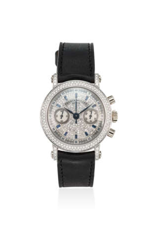 FRANCK MULLER. AN 18K WHITE GOLD AND DIAMOND SET CHRONOGRAPH WRISTWATCH WITH PAVE DIAMOND, SAPPHIRE, AND MOTHER OF PEARL DIAL - Foto 1