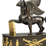 A PAIR OF REGENCY GILT-BRONZE AND PATINATED-BRONZE GRIFFIN PAPERWEIGHTS - фото 5