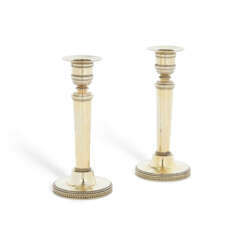 A PAIR OF LOUIS XVI SILVER-GILT TRAVELLING CANDLESTICKS