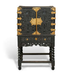AN INDIAN BRASS-MOUNTED EBONY CABINET-ON-STAND