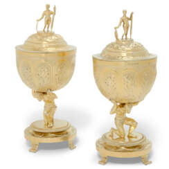 A PAIR OF REGENCY SILVER-GILT CUPS AND COVERS