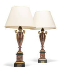 A PAIR OF CHARLES X GILT-METAL-MOUNTED T&#212;LE-PEINTE LAMPS