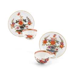 Meissen. TWO PORCELAIN TEA BOWLS WITH SAUCERS AND DECORATED-OVER TABLE PATTERN