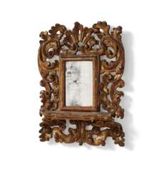 Southern German. SMALL WODDEN MIRROR WITH ROCAILLES AND SHELF