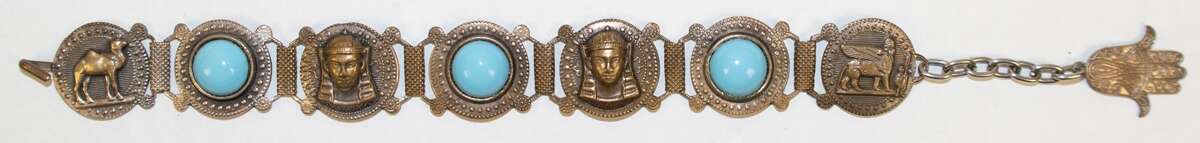 Armband, wohl Ägypten, besetzt mit Türkisen, Reste von Versilberung, Glieder mit figürlichem Relief bzw. mit 3 hellblauen Cabochons besetzt, L. 18 - 22 cm - photo 1