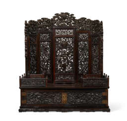 A LARGE AND MAGNIFICENT IMPERIAL CARVED ZITAN MIRROR STAND