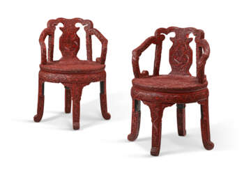 A RARE PAIR OF CARVED RED LACQUER ARMCHAIRS