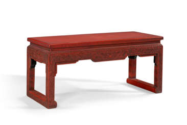 A CARVED RED LACQUER KANG TABLE
