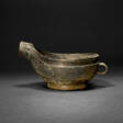 A BRONZE RITUAL POURING VESSEL, YI - Auction archive