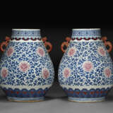 A PAIR OF LARGE BLUE AND WHITE AND PUCE-ENAMELED HU-FORM VASES - photo 2
