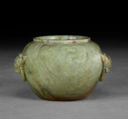 AN UNUSUAL WELL-CARVED MOTTLED YELLOWISH-GREEN AND DARK BROWN JADE JAR