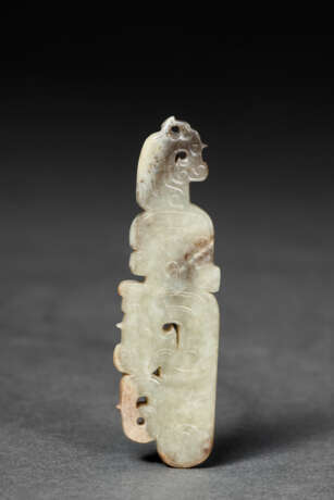 A PALE GREYISH-BEIGE AND BROWN JADE PENDANT - photo 2
