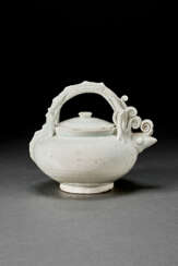 AN UNUSUAL WHITE-GLAZED DRAGON-HANDLED EWER AND COVER