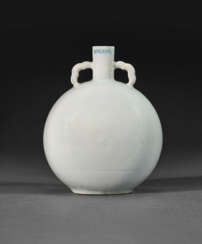 A VERY RARE SMALL INCISED WHITE-GLAZED &#39;LOTUS SCROLL&#39; MOON FLASK
