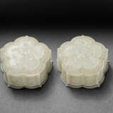 AN UNUSUAL PAIR OF PALE GREYISH-WHITE JADEITE RETICULATED FLOWER-SHAPED BOXES AND COVERS - photo 1