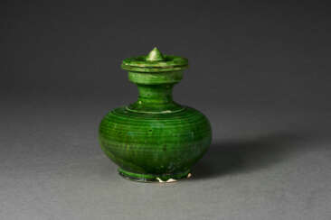 A GREEN-GLAZED JAR AND COVER