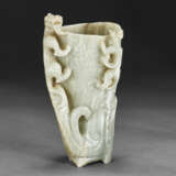 A GREENISH-WHITE JADE RHYTON - photo 1