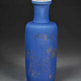 AN UNUSUAL SMALL FAMILLE VERTE AND GILT-DECORATED POWDER-BLUE-GLAZED `RIVERSCAPE` ROULEAU VASE - photo 1