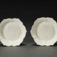 A RARE PAIR OF SMALL MOLDED WHITE-GLAZED ‘LOTUS’ DISHES - Auktionspreise