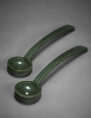A VERY RARE PAIR OF MASSIVE SPINACH-GREEN JADE LADLES