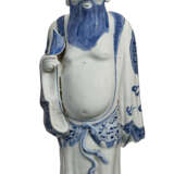 A BLUE AND WHITE FIGURE OF A STANDING IMMORTAL - photo 2